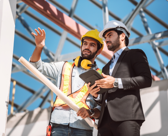 Image of two workers on a construction site