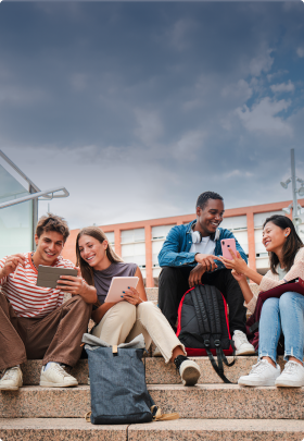 Image of students sitting on stairs outside