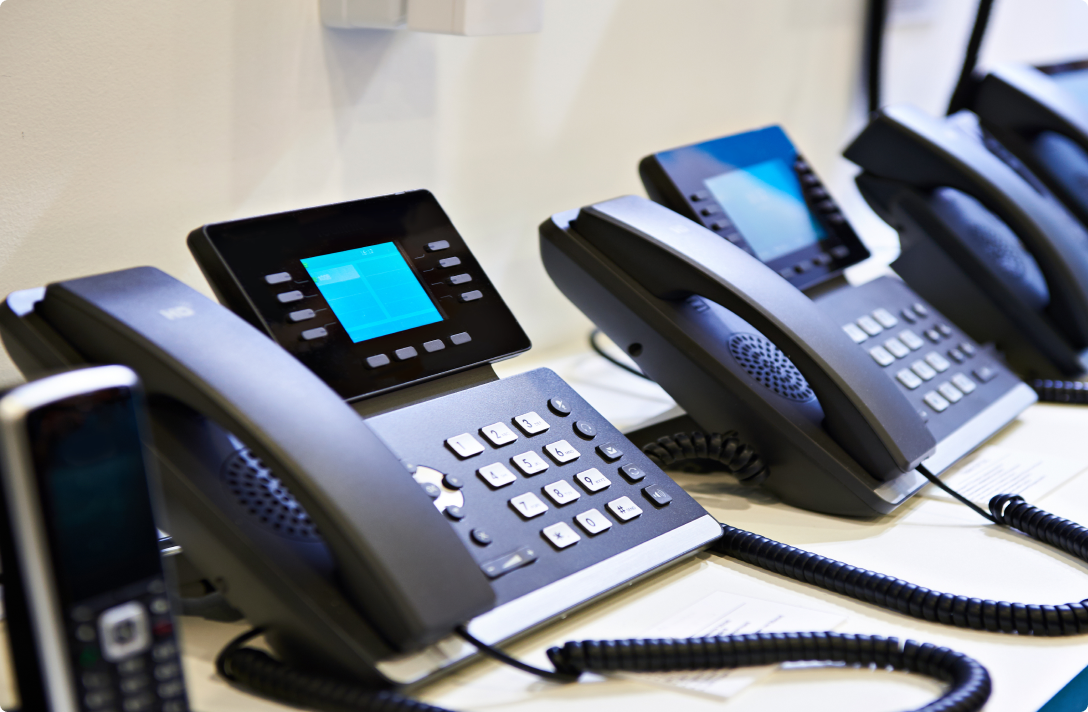 Image of landline phones side by side